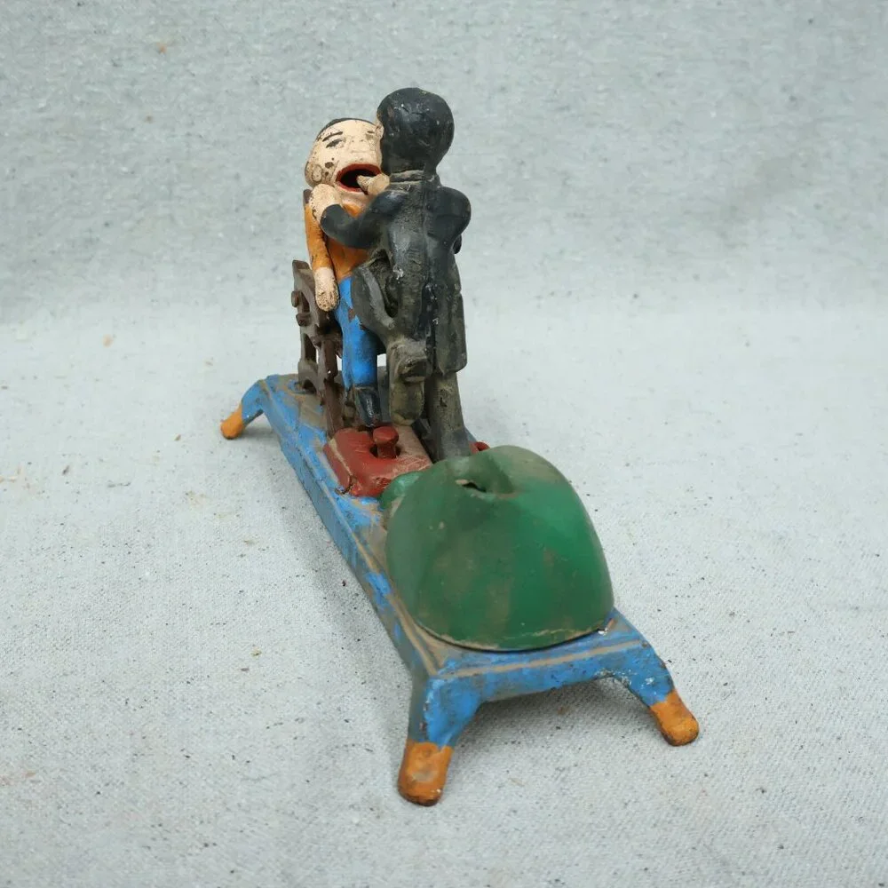 Collectable Cast Iron Mechanical Bank Dentist Pulling Tooth